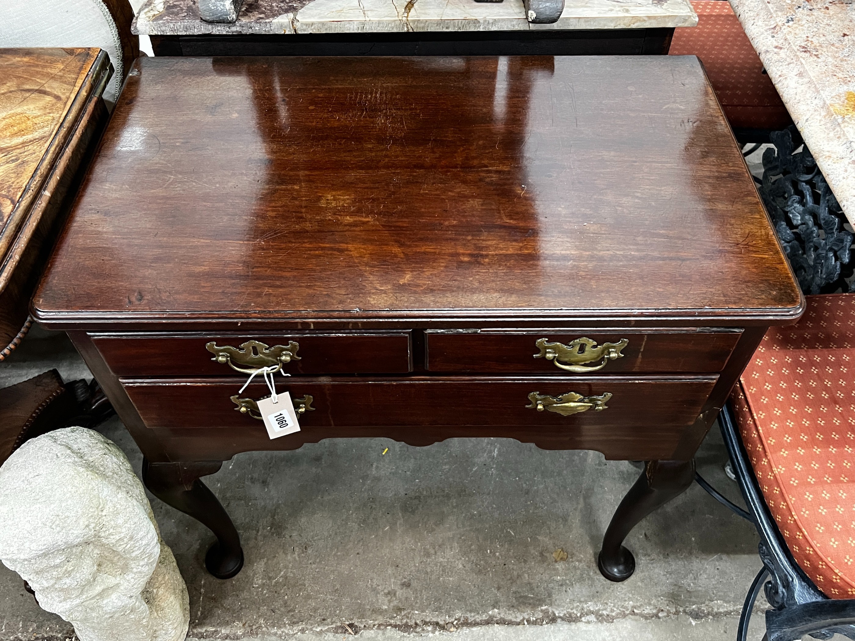 A George III style mahogany lowboy, width 66cm, depth 45cm, height 73cm